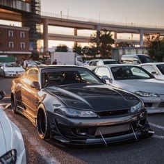 some cars are parked in a parking lot