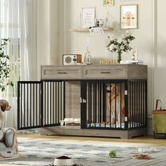 a dog sitting in front of a baby crib next to a table with flowers on it