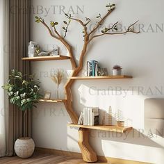 a living room with bookshelves and a tree on the wall in front of it