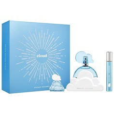 a blue box with two bottles next to it and a white cloud in the middle