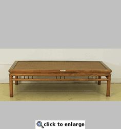 a coffee table with a drawer on top