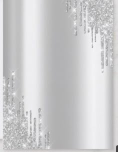 a silver shower curtain with white glitter on it