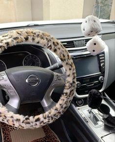 the steering wheel cover is decorated with leopard print