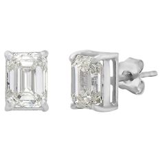 The Emerald Cut Diamond Rectangular Studs Earrings are a stunning and timeless addition to any jewelry collection. Featuring a pair of beautiful emerald-cut diamonds totaling 2.03 carats, each diamond is meticulously set in a classic and elegant four-prong setting made of high-quality 14K gold. The emerald cut of the diamonds creates a mesmerizing effect, catching the light from every angle and showcasing their natural beauty and brilliance. The rectangular shape of the diamonds adds a touch of modern sophistication to the design, making these earrings suitable for both formal and casual occasions. The stud-style setting ensures that they sit comfortably and securely on the ear, making them a practical and comfortable choice for everyday wear. The earrings are also made of 14K gold, which Emerald Cut Stud Earrings, Stud Style, Emerald Cut Diamond, Studs Earrings, Emerald Cut Diamonds, Emerald Cut, Jewelry Earrings Studs, Fashion Set, Prong Setting