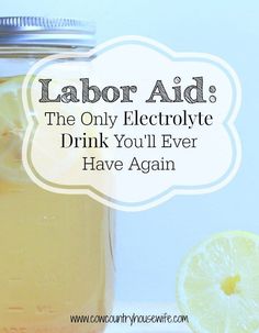 a mason jar filled with lemonade next to a sliced lemon and the words labor aid