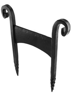 a black iron hook on a white background