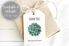 a gift tag with a succulent plant on it