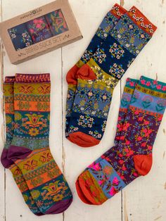 Our Boho Sock Set in our plum floral prints will brighten up any outfit in a playful and boho-colorful way. Wear these comfy socks with your favorite shoes while you're running errands, grabbing a coffee, or just hanging around the house! They’re not too loose or too tight -- they fit just right! These socks come in a set of three and are the perfect gift for anyone on your list. Plus, this adorable sock set is already packed in a box for easy gift giving! Boho Socks, Colorful Website, Colorful Sneakers, Comfy Socks, Fun Socks, Cute Gift Boxes, Cozy Socks, Cozy Throw Blanket, Boho Accessories