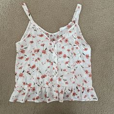 Never Worn Perfect Condition White Printed Cami Tops, Spring White Printed Tank Top, White Feminine Tank Top For Spring, White Printed Tank Top For Spring, Feminine White Tank Top For Vacation, White Floral Print Cami Tank Top, White Casual Tank Top For Spring, Casual White Tank Top For Spring, White Casual Tank Top With Floral Print