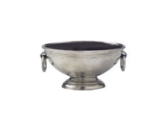 a silver bowl with two handles is shown