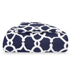 a blue and white comforter set on a white background