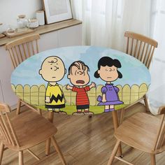 a table with peanuts and charlie brown on it