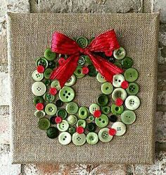 a christmas wreath made out of buttons on a burlock