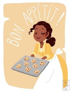 a girl holding a tray of cookies with the words bon appetit on it