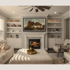 a living room filled with furniture and a flat screen tv mounted above a fire place