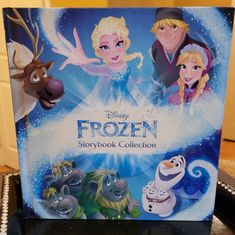 the disney frozen storybook collection is on display