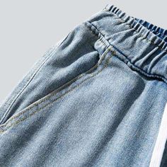 Revive the 90s vibe with our 2023 Spring-Summer Collection of baggy men's denim joggers! These mid-waist. drawstrings closure joggers will take you back to the iconic fashion of the millennium with their light wash. giving you the perfect balance of modern and vintage fashion.Why You'll Love It 90s Vibe: Unapologetically playful and stylish. the 90s vibe radiates from this denim jogger. Light Wash: The light wash ensures a soft and subtle look. allowing you to make a statement without being too Casual Jeans With Elastic Waistband For Streetwear, Streetwear Cargo Jeans With Elastic Waistband, Streetwear Straight Leg Cargo Jeans With Elastic Waistband, Straight Leg Cargo Jeans With Elastic Waistband For Streetwear, Hip Hop Style Medium Wash Pants For Spring, Spring Hip Hop Style Medium Wash Pants, Summer Streetwear Medium Wash Jeans, Denim Pants With Elastic Waistband For Streetwear, Medium Wash Jeans For Summer Streetwear