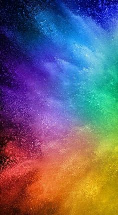 a rainbow colored background with water splashing on it