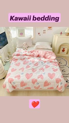 a bed with pink hearts on it in a bedroom