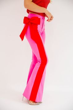 HOLIDAY SEASON FLARES FLARES Judith March SMALL PINK Pink Stretch Pants For Party, Playful Red Bottoms For Spring, Pink Flare Pants For Party, Red Flare Pants For Party, Chic Holiday Pants, Chic Pink Flare Pants, Funky Pants Outfits, Barbie Looks Outfits, Clothing Photoshoot Ideas Products