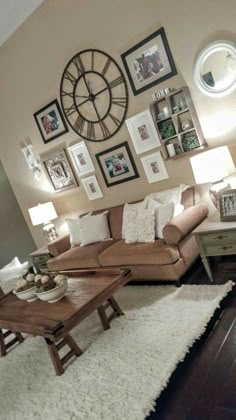 a living room filled with lots of furniture and pictures on the wall above it's coffee table