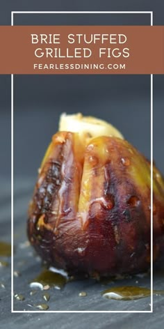 an image of grilled figs on the grill with text overlay reading brie stuffed grilled figs