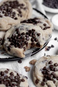 chocolate chip cookies on a plate with spoons