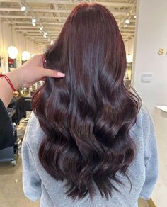 Cherry Cola Red Is The Luxe Hair Color You’ll Be Into This Season Subtle Cherry Red Hair, Dark Cherry Cola Hair Color Brown Skin, Coca Cola Red Hair, Cola Brown Hair, Dark Dark Red Hair, Dark Brown Cherry Hair Color, Cherry Coke Balayage