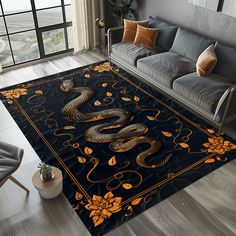 a living room area with a couch, chair and rug on the floor in front of a window