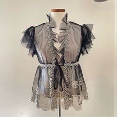 Preowned And In Excellent Condition! Anna Sui Black Mesh Ruffle Top See Through Silhouette Roses Embroidered Through Out Tie Waist Size 8 100% Polynet/ Embroidery 100% Rayon Does Not Come With Slip No Rips Or Tears In The Fabric Rare Top Cottagecore Boho Random Pictures, Anna Sui, Ruffle Top, Black Mesh, Black Cream, Waist Size, Top Blouse, Roses, Womens Tops