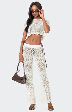 Have all eyes on you in these cool Fable Crochet Pants from Edikted. Their comfortable and unique fabric will surely make the statement you've been after. PantsCrochet fabricMatching setCotton, PolyesterModel wears size SModel height is 5'9Item care: Wash with similar color Edikted Womens Fable Crochet Pants - Ivory size Large Pants Crochet, Visionary Fashion, Fabric Matching, Crochet Pants, Crochet Fabric, Unique Fabric, Swimwear Dress, Crop Sweater, Crochet Crop Top