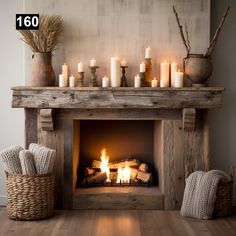 a fire place with candles and blankets on the mantle, next to two wicker baskets