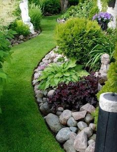 a garden with lots of rocks and plants