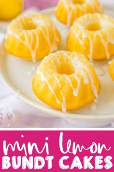 mini lemon bundt cakes with icing on a white plate and pink tablecloth