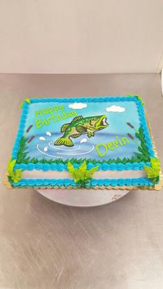 a birthday cake with a fish on it