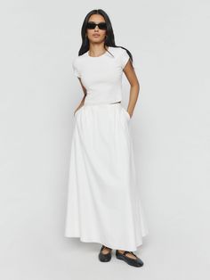 Looks great with a gust of wind.  Shop the Petites Lucy Skirt from Reformation, an A-line, ankle length skirt with a fitted waist and full skirt. White Maxi Outfit, Modest Hot Weather Outfits Summer, A Line Maxi Skirt Outfit, White A Line Skirt Outfit, White Poplin Skirt Outfit, White Peasant Skirt Outfit, White Cotton Maxi Skirt, White Cotton Skirt Outfit, Modest European Summer Outfits