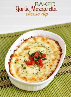 garlic mozzarella cheese dip in a white bowl on a green place mat with text overlay