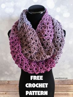 a purple and gray crocheted scarf on a mannequin