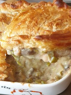 a casserole dish with meat and vegetables in it is ready to be eaten