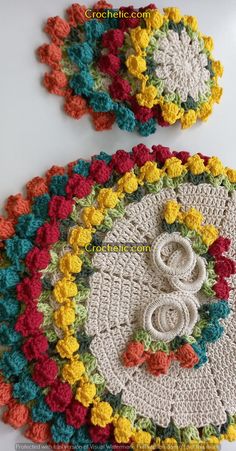 two crocheted placemats on top of each other