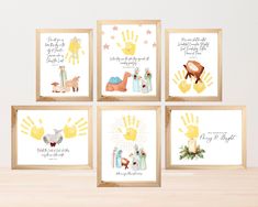 four christmas cards in wooden frames with hand prints on the front and back, featuring nativity