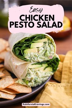 a chicken pesto salad wrap on a plate with tortilla chips