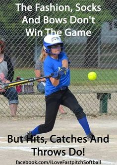 a girl swinging a bat at a ball on a baseball field with the caption, the fashion socks and bows don't win the game but hits, catches and throws do