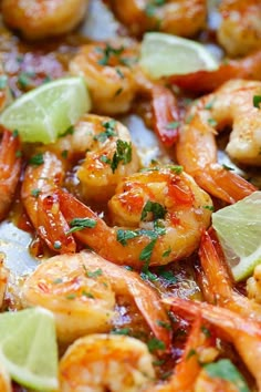 a close up of some shrimp and limes