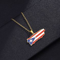 This pendant necklace features a map of Puerto Rico etched onto a delicate pendant. The pendant hangs from a dainty chain, making it the perfect accessory for those who love to travel or have a connection to a specific country. The intricate map design adds a unique touch to any outfit and is a meaningful way to show your pride for your heritage or favorite country. It is a perfect gift for travelers, expats, and anyone who wants to show off their love for a particular country. The pendant is ma Puerto Rico Map, Patriotic Jewelry, Pride Support, Puerto Rico Flag, Flag Outfit, Map Pendant, Country Wear, Map Necklace, Golden Heart