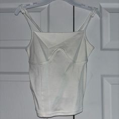 White Never-Been-Worn Tank Top, Nwt, Extra Small White Fitted Top With Tank Straps, Fitted White Top With Tank Straps, White Fitted Tank Top, White Stretch Cami Crop Top, Chic White Crop Top With Adjustable Straps, White Sleeveless Camisole With Built-in Bra, White Fitted Sleeveless Crop Top, White Tank Top With Adjustable Spaghetti Straps, White Stretch Crop Top With Tank Straps