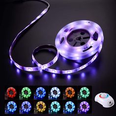 an assortment of colorful lights and cords on a black surface with the cord connected to it