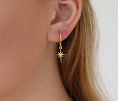 18k gold star earrings with hoop studs. non tarnish earrings. the length of the earrings is 1 inches long. Dainty Gold Plated Earrings With Star Charm, Dainty Gold-plated Earrings With Star Charm, 14k Gold Filled Star Charm Earrings For Gift, 14k Gold Filled Star Charm Earrings As Gift, 14k Gold Filled Huggie Earrings With Star Charm, Gold Star Earrings, Butterfly Earrings Gold, Star Necklace Gold, Bow Earrings