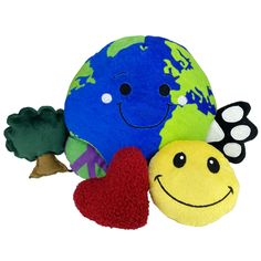 two stuffed animals are sitting next to each other with the earth on it's back