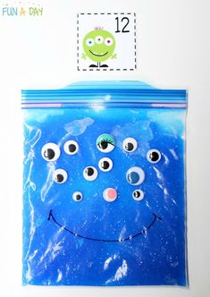 a blue bag with eyes on it and a card in the middle that says fun at day